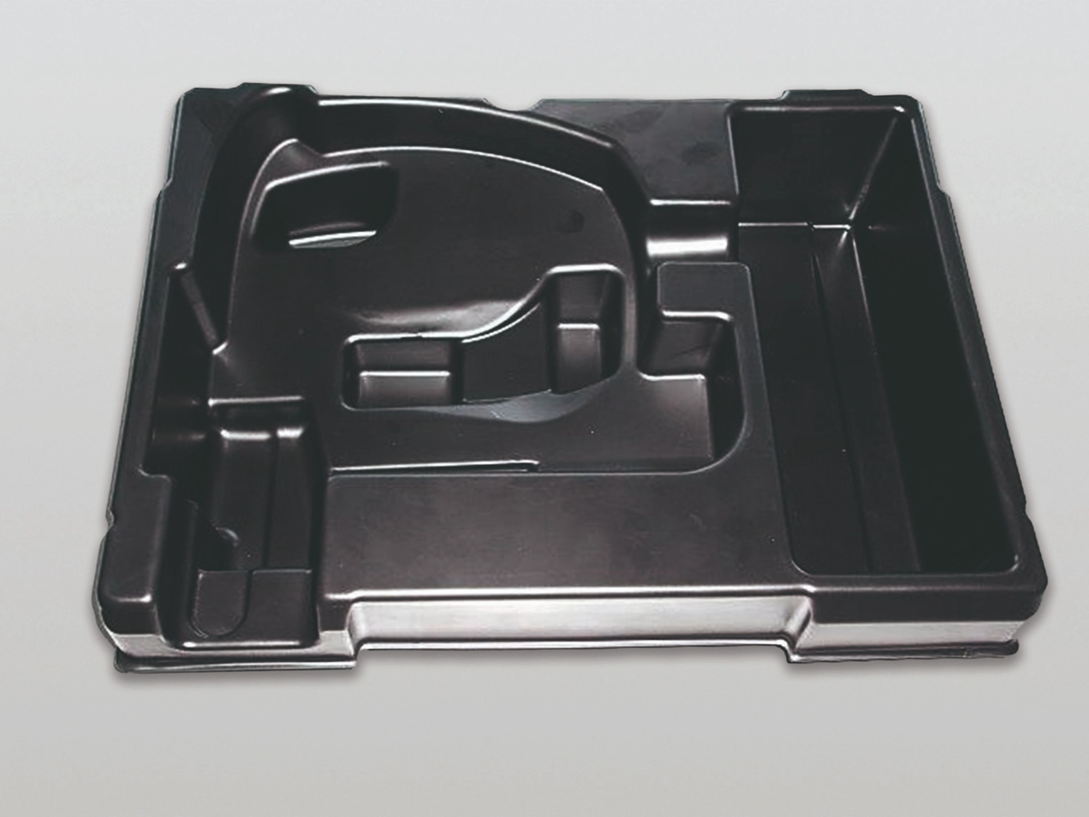 schwarzer Tray als Koffereinsatz